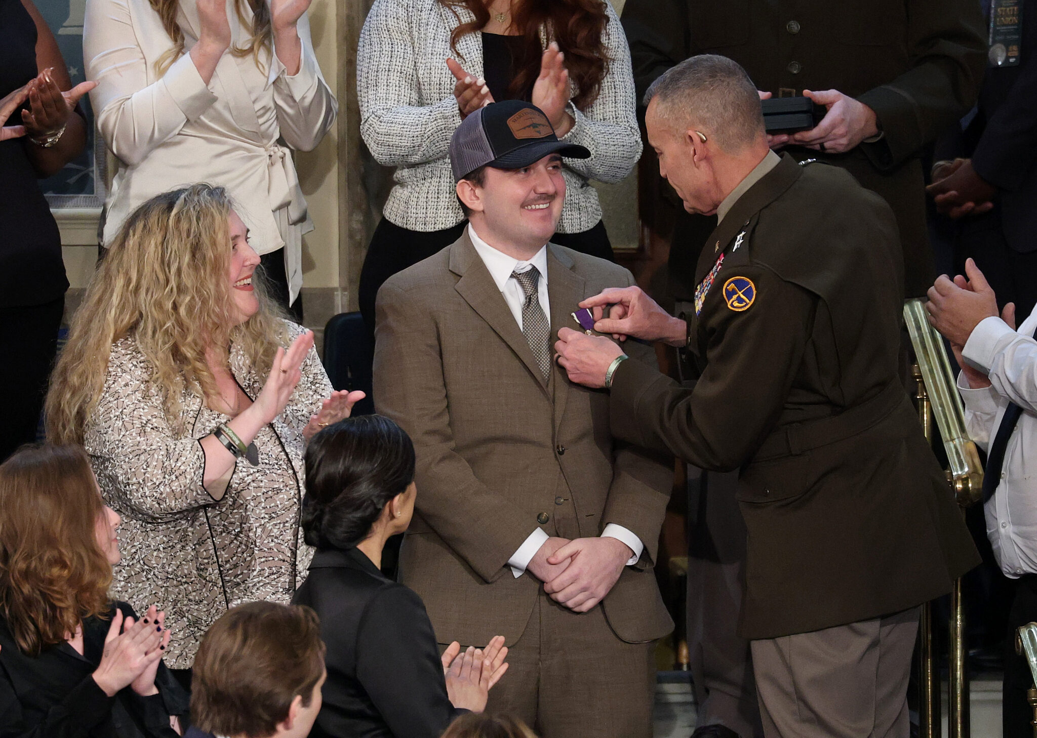 Featured image for “WV National Guard members shot while deployed in DC last year receive Purple Heart from Trump”